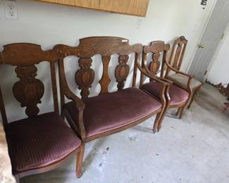 Carved Settee and matching chairs.