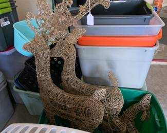Pair of lighted golden reindeer
