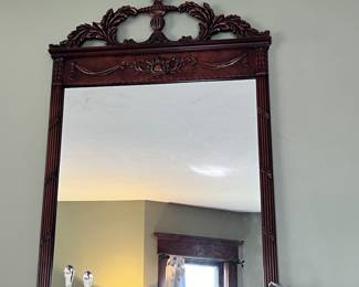 Ornate antique hanging wall mirror