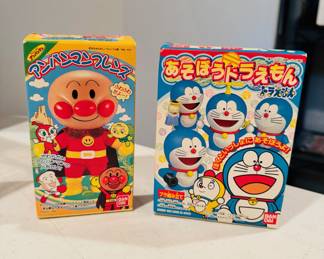 Vintage Anpanman, Japan plush toy in it’s original unsealed box and Doraemon, Japan plastic model kit also in original unsealed box