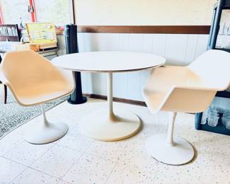 Vintage tulip chairs and dining table. Each chair and the dining table will be sold individually as they do not coordinate