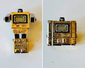 1983 Takara Microman Watch Robo Gold, a Transforming robot watch. There is no watch strap