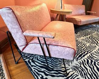 Amazing 1950’s Dan Johnson for Pacific Iron two-piece sofa set in pink boomerang vinyl upholstery