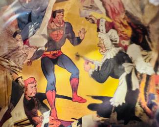Very cool vintage decoupage glass vase with a great assortment of 1950’s cutouts and Super Hero’s