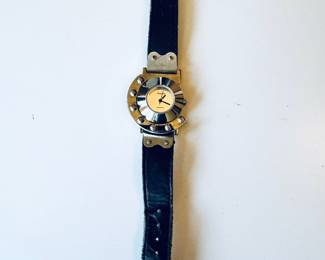 Very cool vintage steam punk stainless steel and leather wrist watch. The metal stud section can rotate around the watch face