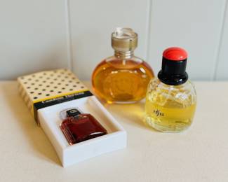 Vintage Carolina Herrera, Versace and Yves Saint Laurent perfumes. The Carolina Herrera is New In Box