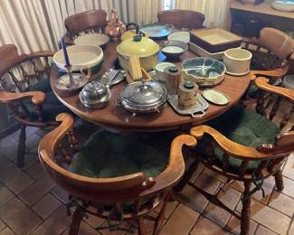 Breakfast table and six captain's chairs