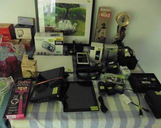 Camera Equipment, Ipad, Laptops, Clock, Tripod