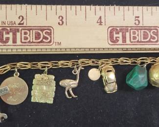 18K Bracelet With 8 Charms