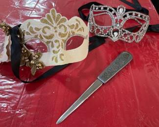 Unusual masks, letter opener. Just some of the unique items at this sale