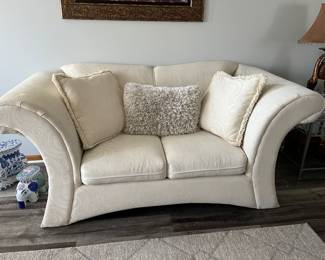 Upholstered loveseat and matching......