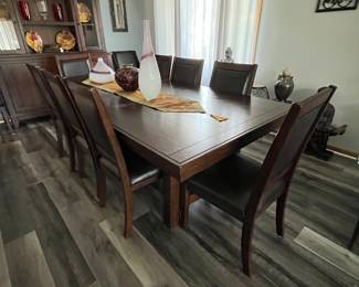 Millennium by Ashley dining table with 8 chairs!