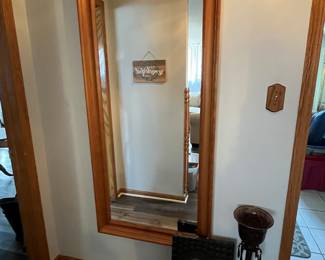 Wood framed wall mirror