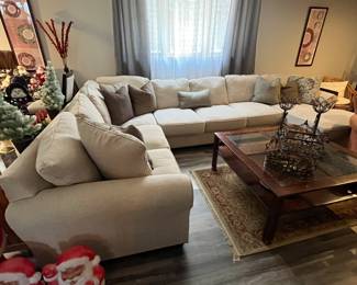 Upholstered sectional sofa with chaise......