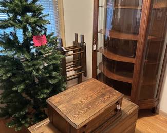 Curved glass china cabinet, trunk, spool drawer, Christmas tree