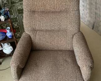 Light brown recliner. Measures 30” w x 38” d x 37” h. Presale $75