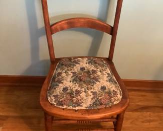 Antique chair with floral upholstered seat….