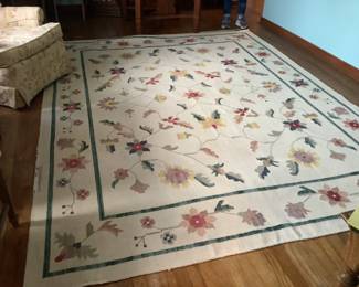 Gorgeous clean white rug with floral pattern measures 8 x 10. Clean and also reversible.