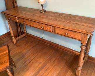 Sofa table measures 60” w x 17” d x 29” h. has three drawers. Perfect for flat screentv