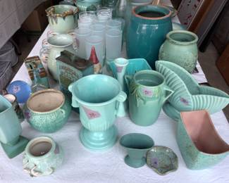 Lots of beautiful turquoise pottery, Roseville included.