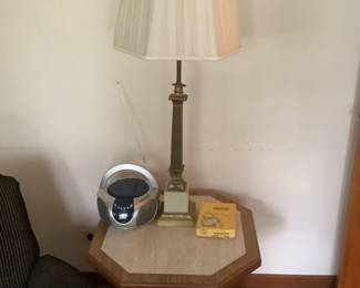 Octagon end table with tall vintage lamp