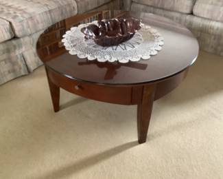 36 round x 18” h coffee table with glass top. Presale $135.