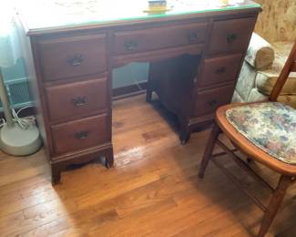 Older desk that measures 42” w x 20” d x 30” h. Has glass top. Presale $75