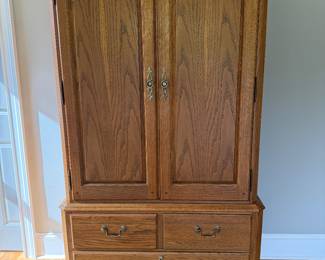 #25 Thomasville oak wardrobe 44x18x72 $150.00