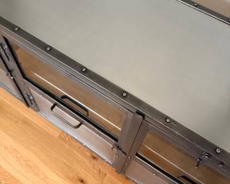 #32 Metal with doors glass cabinet 60x16x27 $125.00