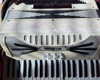 #33 MELODIANA Accordian with case $100.00