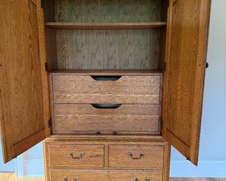 #25 Thomasville oak wardrobe 44x18x72 $150.00