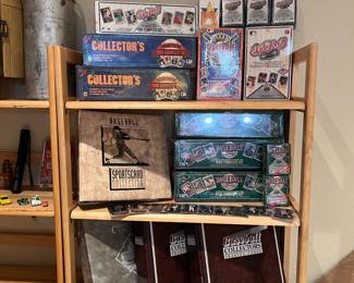 Lots of baseball cards… several unopened box sets from the late 80s and early 90s… Ken Griffey Baby!