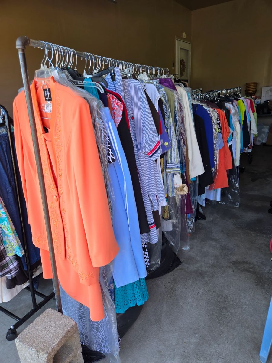 Racks and racks of WOMEN'S CLOTHING that have are in excellent condition.