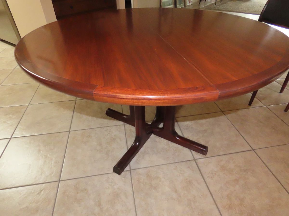 Rosewood table with extra leaves. Made in Norway.