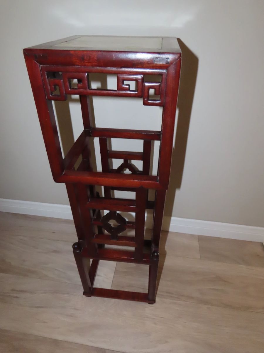 Rosewood Asian themed stand.