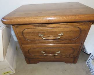 Honey oak nightstand/2 drawer chest.