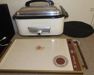 Second warming tray and very large elcectric roasting oven.