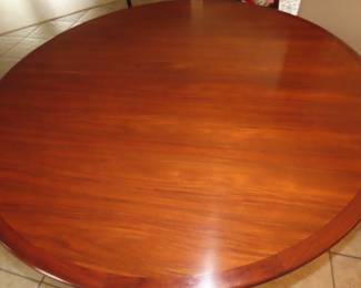 Rosewood table with extra leaves. Made in Norway.