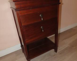 Antique sewing notions storage cabinet.