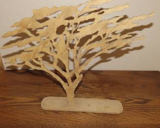 Carved wood Serengeti tree.