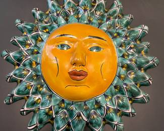 Costa Rican masks and ceramic wall hangings