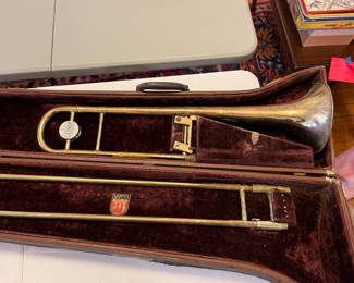 Vintage Conn trombone, still plays but needs some repairs