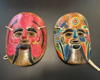 Costa Rican masks and ceramic wall hangings