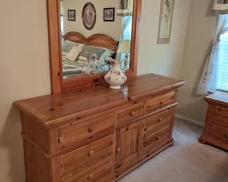 Broyhill Dresser with Mirror - Solid Knotty Pine - $600. 70" wide, 19" deep, 33.5" tall, Mirror is 46.5" tall.