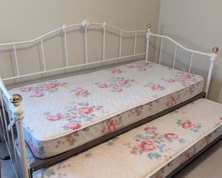 Sturdy IRON TRUNDLE BED - $180 (with 2 twin mattresses).