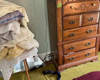 dresser, tv, rugs, bedding, table, mirrors