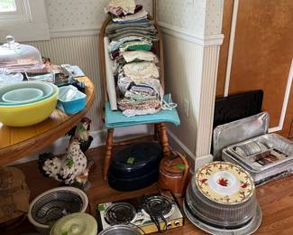 doilies, dish towels, hot pads, pots, kettles,aluminum pans