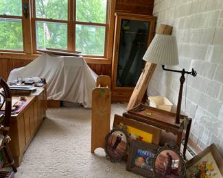 gun case, cedar chest, table lamp, quilt rack
