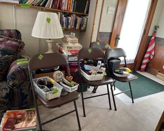 lamp, games, books, folding chairs, misc