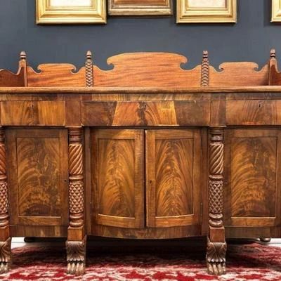 EXCEPTIONAL 19th C FLAME MAHOGANY SIDEBOARD QUERVILLE $3,500 OBO
Exceptional early 19th c. flame mahogany Classical carved sideboard.
Attributed to Anthony Quervelle of Philadelphia or Edward Priestly of Baltimore Maryland. Carved columns terminating in paw feet. Measures 75"x25"x56" tall to top of backsplash